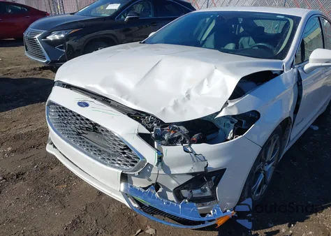 2019 Ford Fusion Hybrid Titanium from USA, damaged, VIN 3FA6P0RU1KR211826
